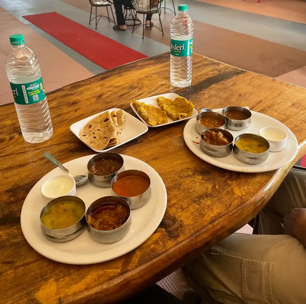 Delicious breakfast spread with variety of dishes at B Hive Resort Londa